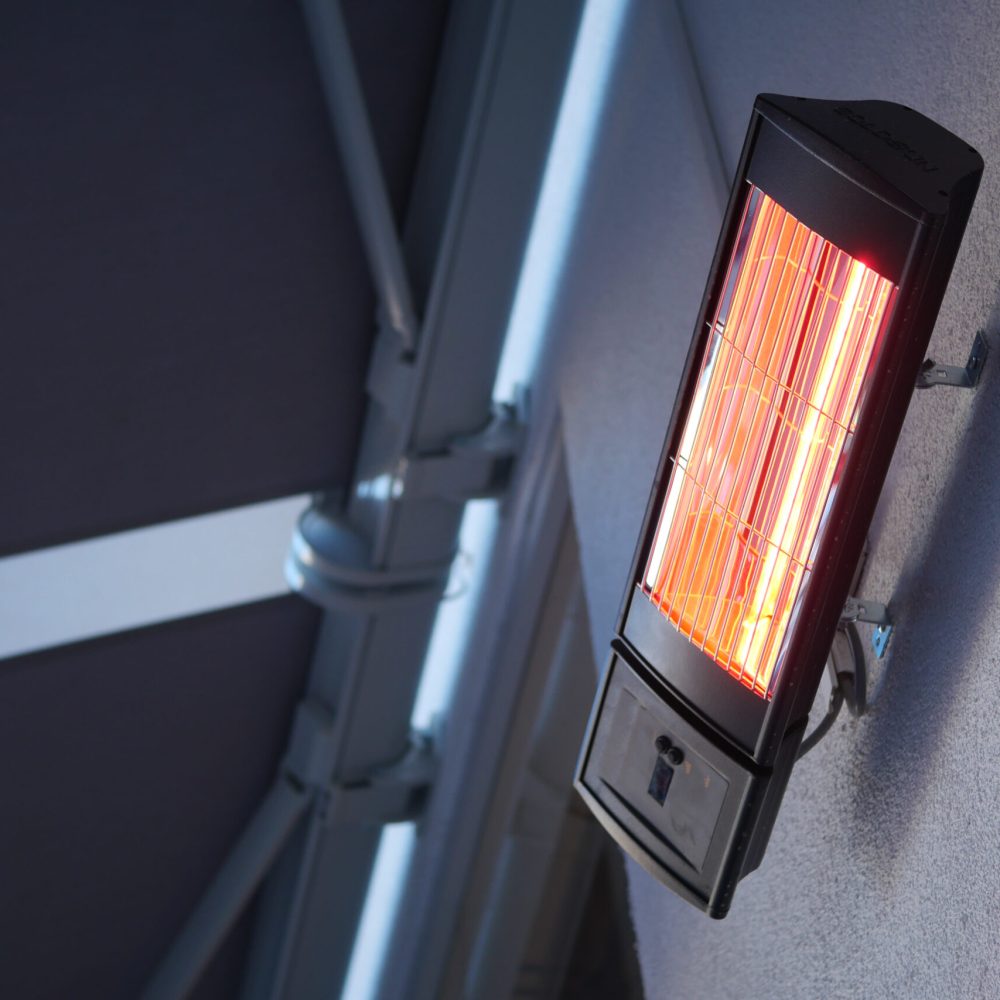 Modern electric infrared heater on celling .